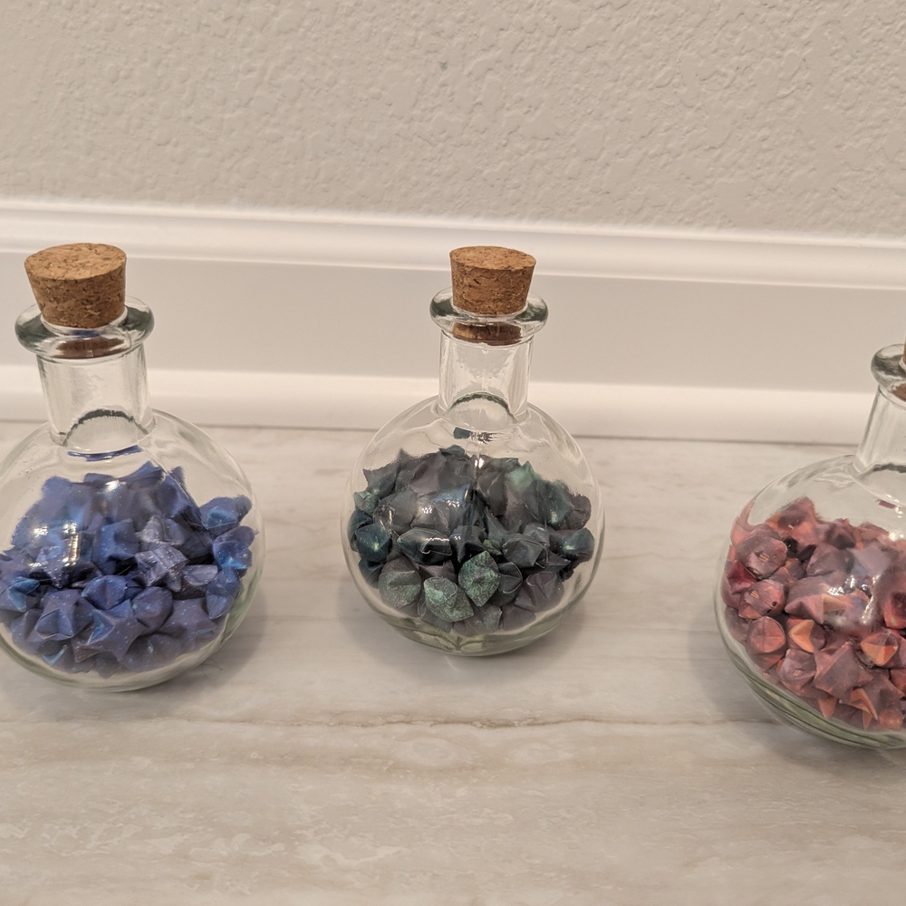 Set of Three Glass Bottles with Origami Stars
